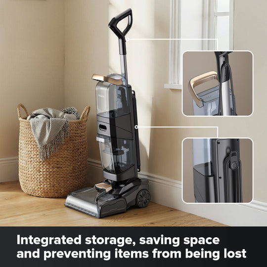Vacuum cleaner with integrated storage feature on a wooden floor next to a basket.