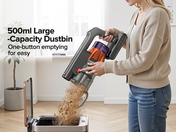 Person using a handheld vacuum cleaner with a large-capacity dustbin to empty debris into a trash can.