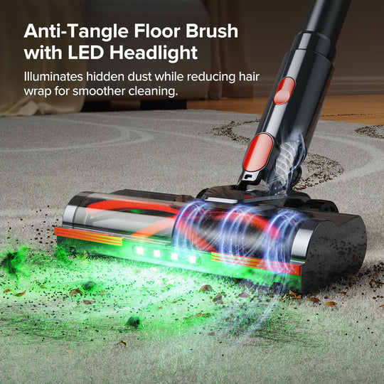 Anti-tangle floor brush with LED headlight cleaning a carpet.