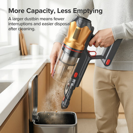 Person using a handheld vacuum cleaner to empty its dustbin into a kitchen trash can.